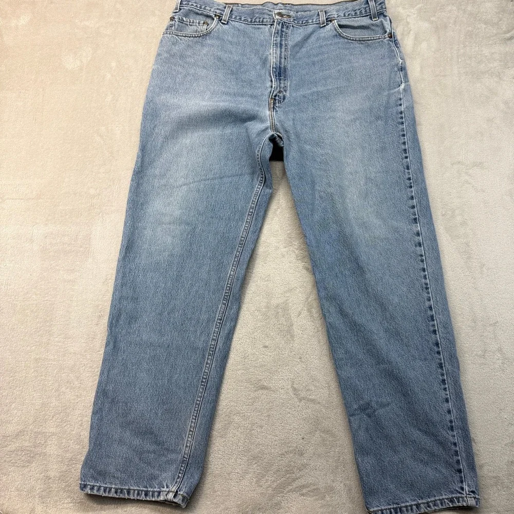 Vintage Levi's 550 Mens 42x32 Blue Relaxed Fit Light Wash 90s Denim Brown Tab - Picture 1 of 12